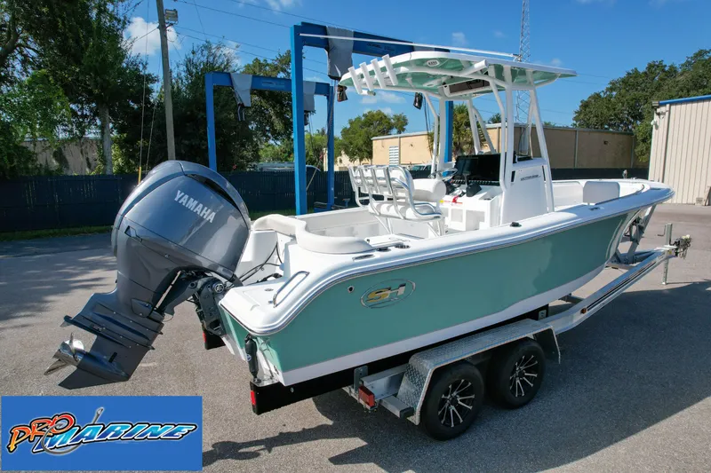 Slide: The Image of 2025 Sea Hunt Ultra 219 boat with Yamaha engine on trailer. - 10