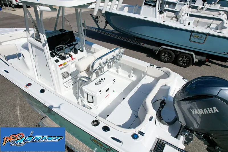 Slide: The Image of 2025 Sea Hunt Ultra 219 boat with Yamaha engine at Pro Marine dealership. - 19