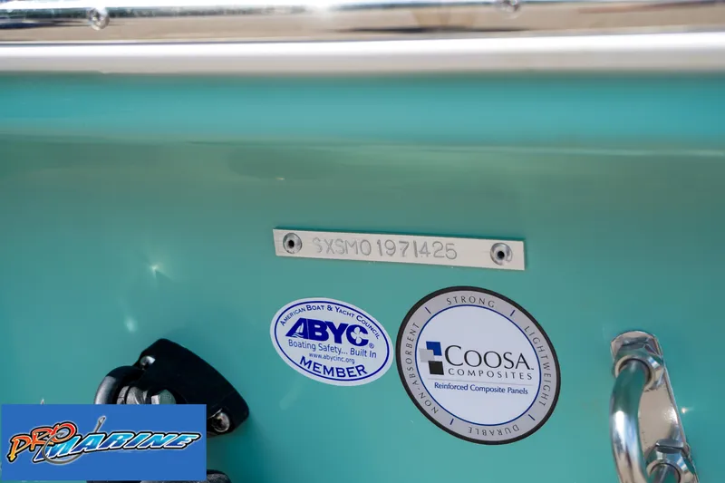 Slide: The Image of 2025 Sea Hunt Ultra 219 boat with ABYC and Coosa Composites certification stickers. - 20