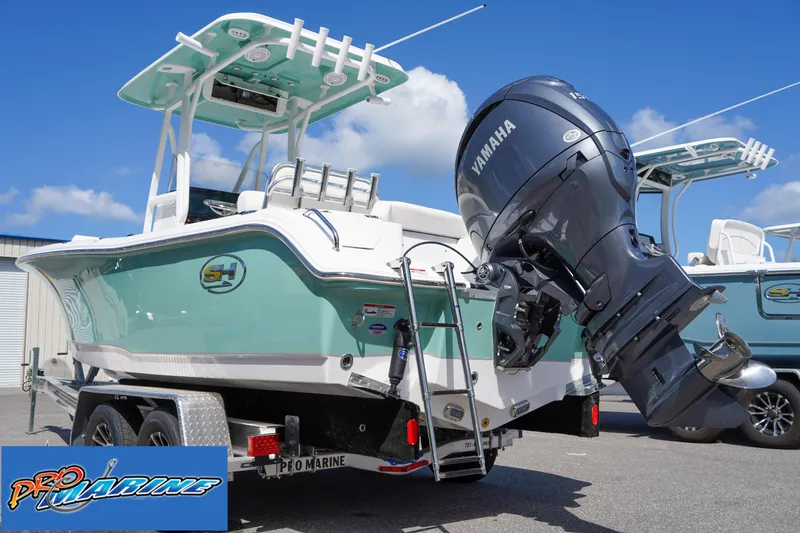Slide: The Image of 2025 Sea Hunt Ultra 219 boat with Yamaha engine on trailer. - 25