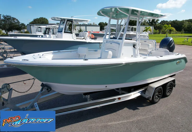 Slide: The Image of 2025 Sea Hunt Ultra 219 boat on trailer at Pro Marine dealership. - 3