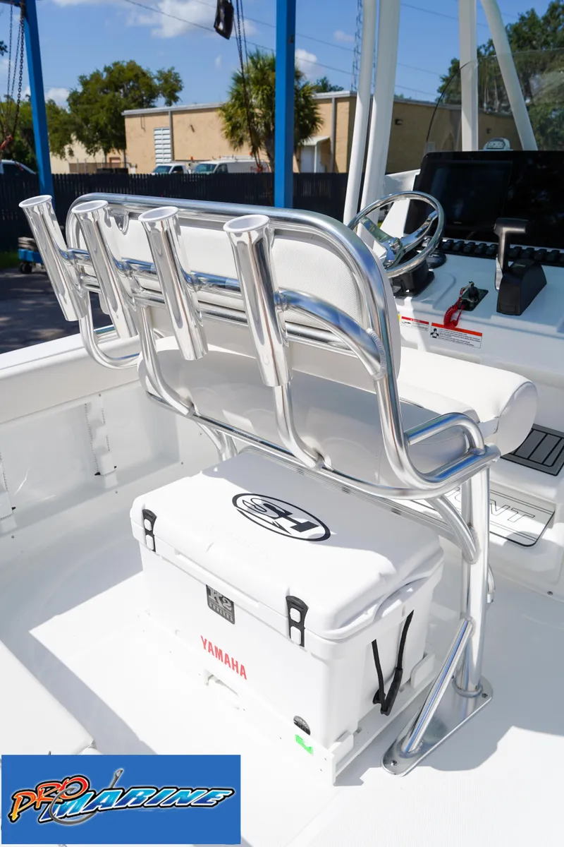 Slide: The Image of 2025 Sea Hunt Ultra 219 boat interior with seating and Yamaha cooler. - 44