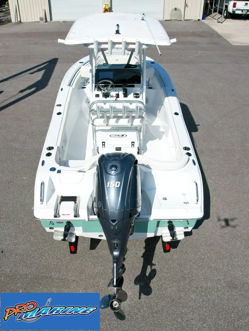 Slide: The Image of 2025 Sea Hunt Ultra 219 boat with Yamaha 150 engine, aerial view. - 8
