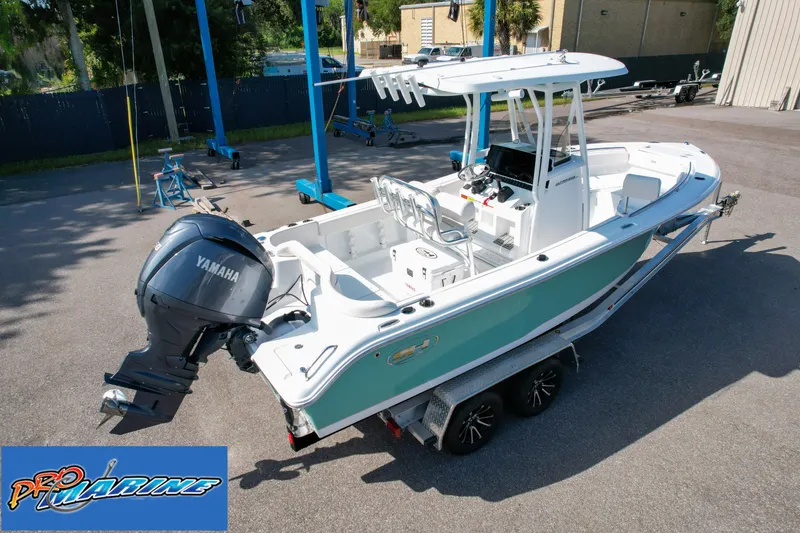 Slide: The Image of 2025 Sea Hunt Ultra 219 boat with Yamaha engine on trailer. - 9