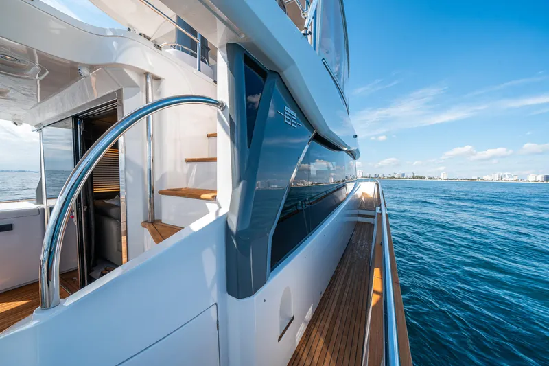 Slide: The Image of Azimut Magellano 66 yacht, 2018 model, with sleek design and ocean view. - 14