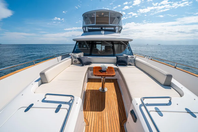 Slide: The Image of Luxurious 2018 Azimut Magellano 66 yacht with spacious deck and ocean view. - 17