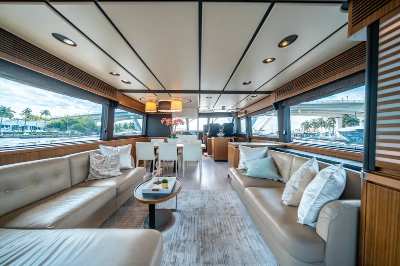 Slide: The Image of Luxurious interior of 2018 Azimut Magellano 66 yacht with elegant seating and dining area. - 20