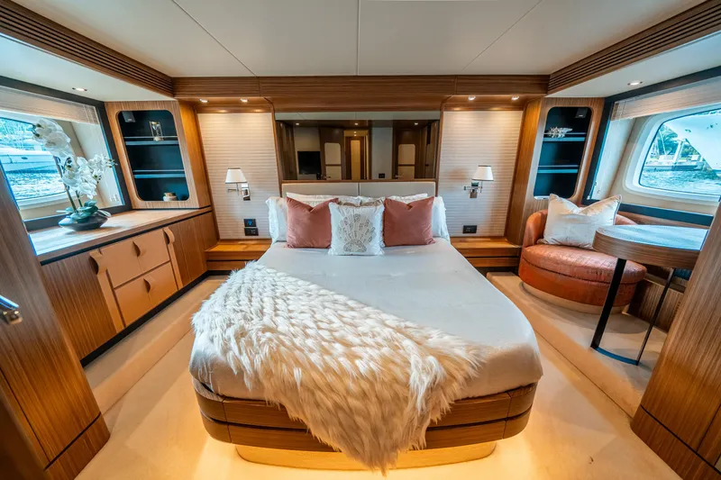 Slide: The Image of Luxurious bedroom interior of 2018 Azimut Magellano 66 yacht with elegant decor. - 28