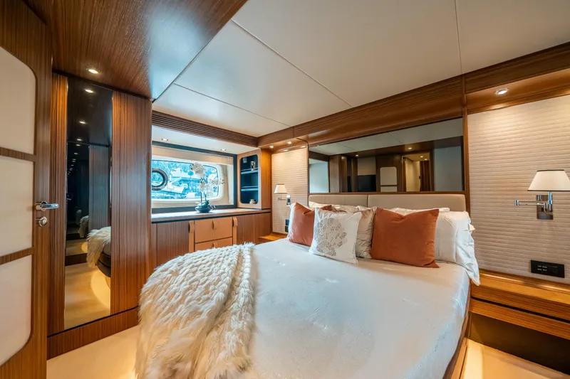 Slide: The Image of Luxurious bedroom interior of 2018 Azimut Magellano 66 yacht with elegant decor. - 29