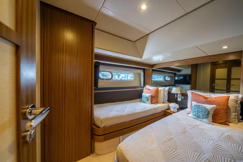 Slide: The Image of Luxurious cabin interior of 2018 Azimut Magellano 66 yacht with elegant bedding. - 41