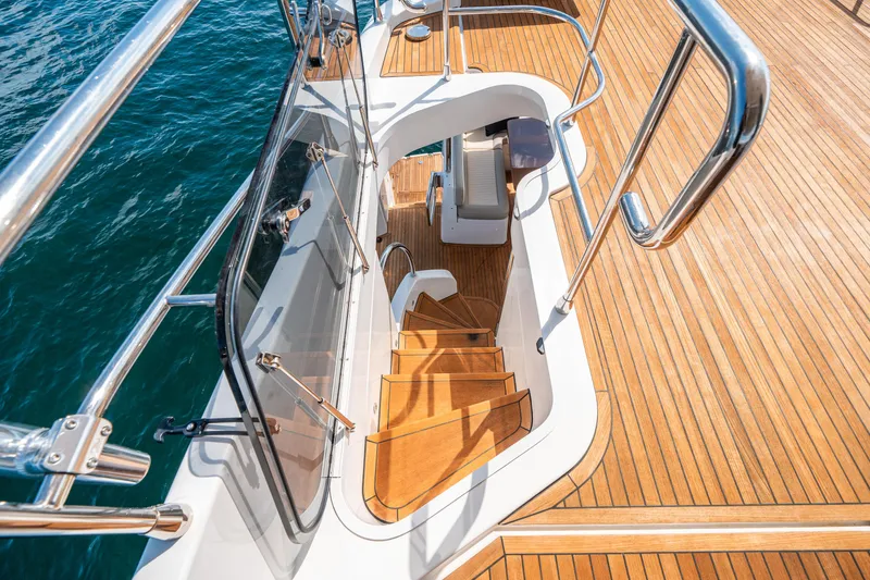 Slide: The Image of Azimut Magellano 66 yacht deck with wooden stairs, 2018 model. - 42