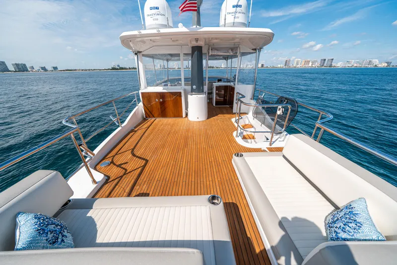 Slide: The Image of Luxurious 2018 Azimut Magellano 66 yacht deck with ocean view and comfortable seating. - 45