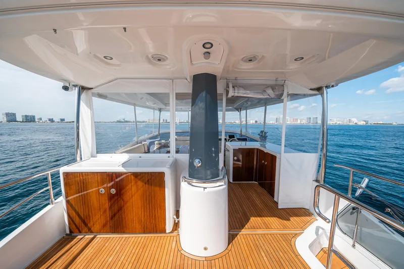 Slide: The Image of Azimut Magellano 66 yacht deck, 2018 model, featuring sleek design and ocean view. - 46