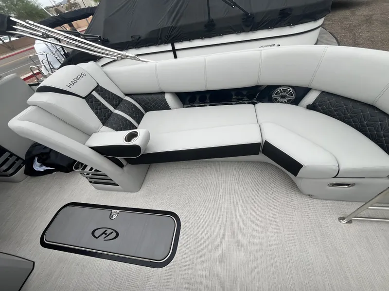 Slide: The Image of 2025 Harris Grand Mariner SL 250 boat interior with luxurious seating and sleek design. - 8