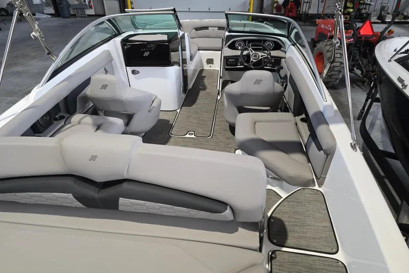 Slide: The Image of 2025 Four Winns HD3 boat interior with modern seating and sleek design. - 11