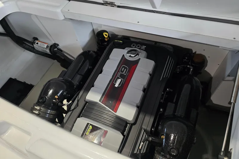Slide: The Image of 2025 Four Winns HD3 boat engine compartment with powerful inboard motor. - 20
