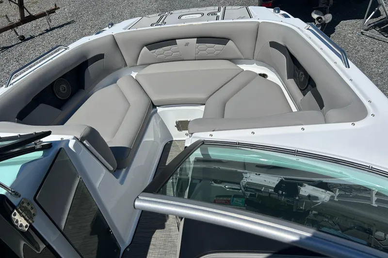 Slide: The Image of 2025 Four Winns HD3 boat interior with gray seating and modern design. - 21