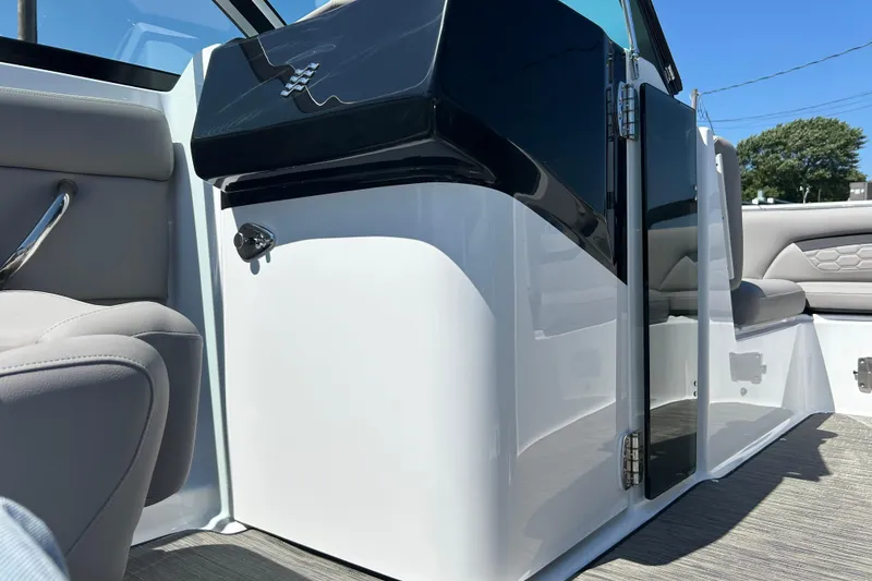 Slide: The Image of 2025 Four Winns HD3 boat interior with sleek seating and modern design. - 24