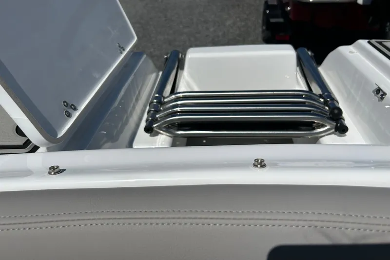 Slide: The Image of 2025 Four Winns HD3 boat with stainless steel swim ladder and storage compartment. - 30