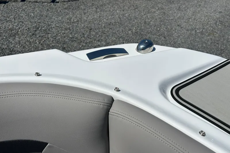 Slide: The Image of 2025 Four Winns HD3 boat interior detail with sleek white and gray design. - 31