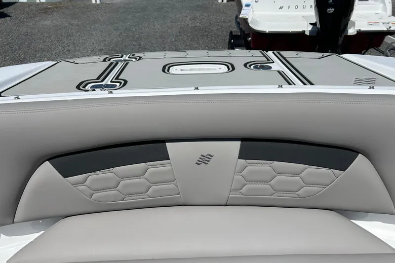 Slide: The Image of 2025 Four Winns HD3 boat interior with stylish upholstery and modern design. - 33