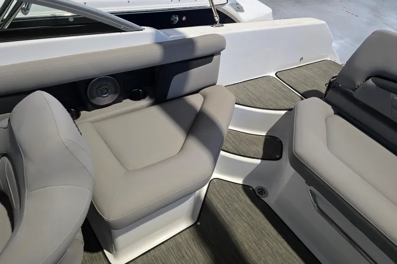 Slide: The Image of 2025 Four Winns HD3 boat interior with gray seating and modern design. - 39