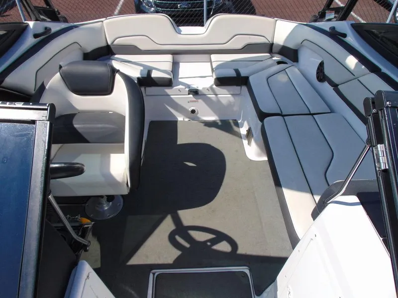 Slide: The Image of 2017 Yamaha AR210 boat interior with spacious seating and modern design. - 11