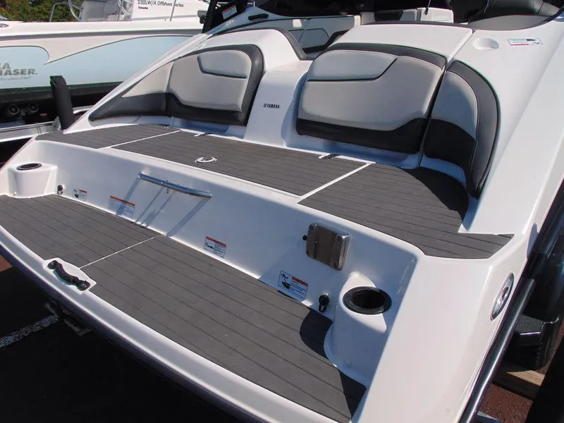 Slide: The Image of 2017 Yamaha AR210 boat with sleek seating and swim platform design. - 3