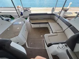 Slide: The Image of 2016 Sea Ray 350 Sundancer interior with spacious seating and elegant design. - 8