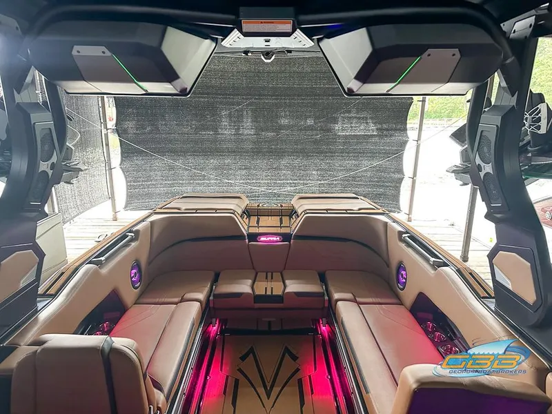 Slide: The Image of 2024 Supra SE boat interior with luxurious seating and ambient lighting. - 20