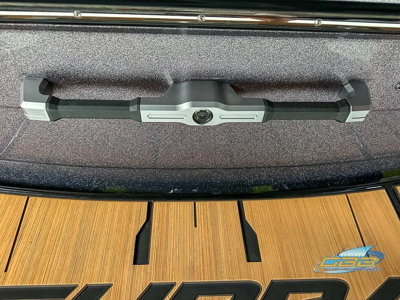 Slide: The Image of 2024 Supra SE rear view camera on textured surface with wooden panel detail. - 24