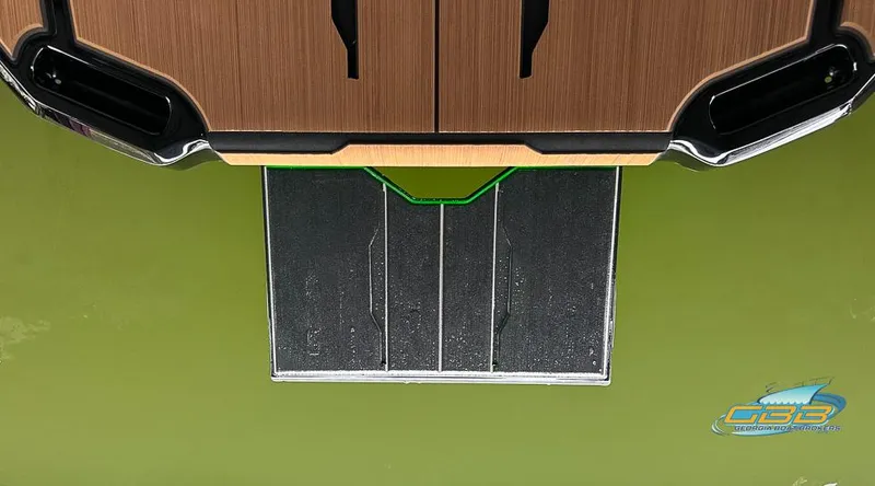 Slide: The Image of 2024 Supra SE boat platform on green water, featuring sleek design and logo. - 30