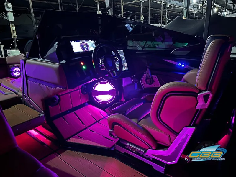 Slide: The Image of 2024 Supra SE interior with ambient lighting, advanced dashboard, and modern seating design. - 37