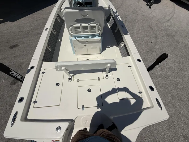 Slide: The Image of 2025 Pathfinder 2600 HPS boat interior with seating and storage compartments. - 10