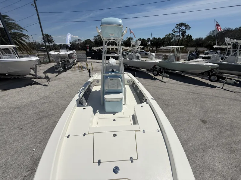 Slide: The Image of 2025 Pathfinder 2600 HPS boat displayed in a marina with other boats. - 14