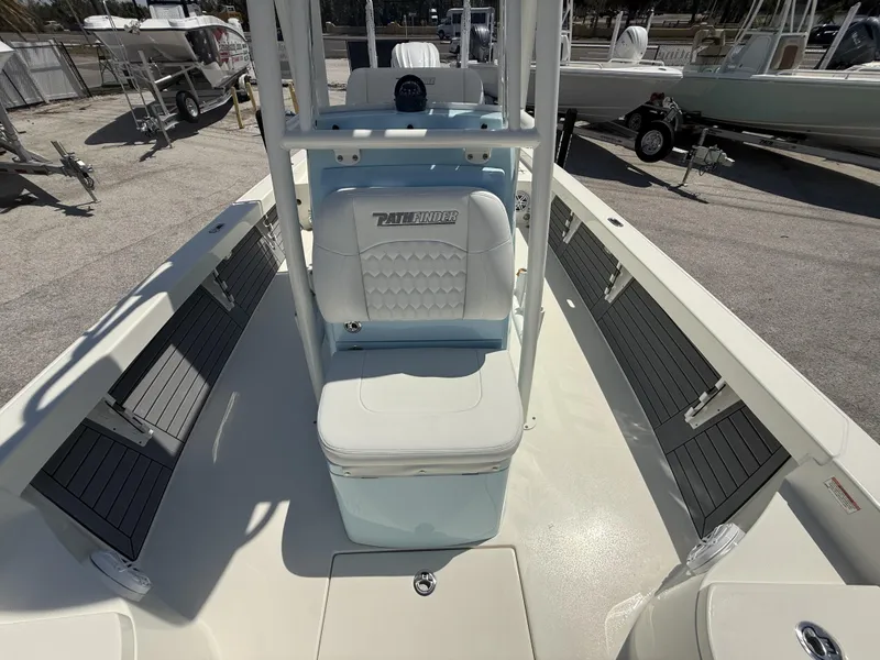 Slide: The Image of 2025 Pathfinder 2600 HPS boat interior with seating and storage compartments. - 21