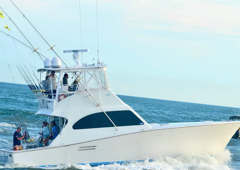 Slide: The Image of 1998 Post 42 Convertible yacht cruising on the ocean with fishing gear. - 0