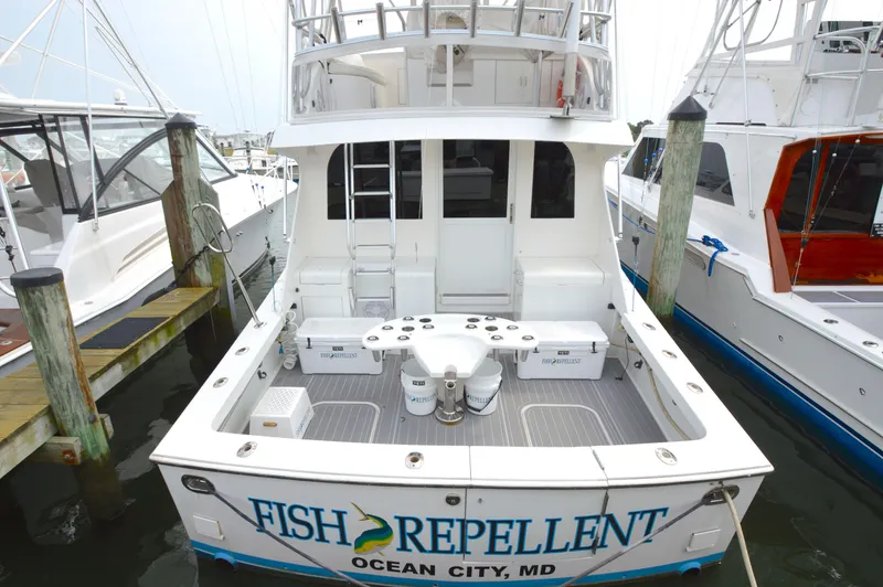 Slide: The Image of 1998 Post 42 Convertible boat named "Fish Repellent" docked in Ocean City, MD. - 19