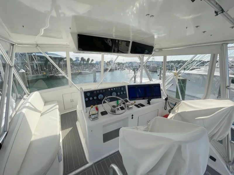 Slide: The Image of Interior of 1998 Post 42 Convertible yacht with helm and navigation equipment. - 21