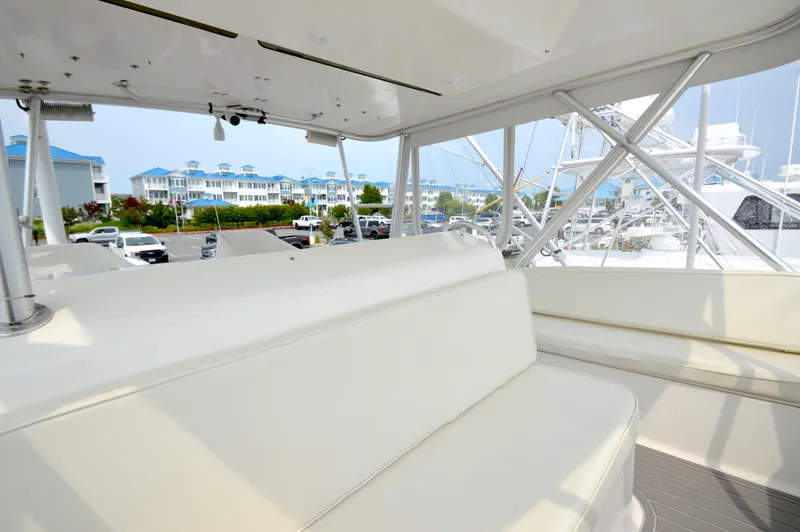 Slide: The Image of Interior view of 1998 Post 42 Convertible yacht with marina background. - 34