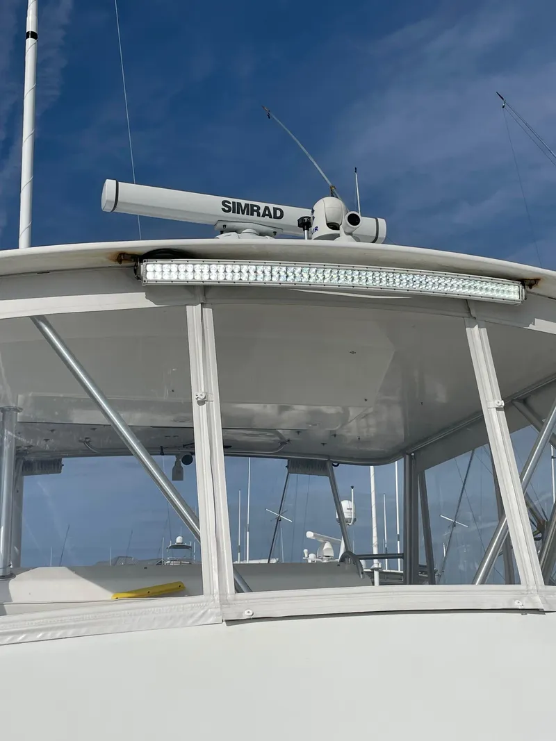 Slide: The Image of 1998 Post 42 Convertible boat with Simrad radar and LED light bar. - 36