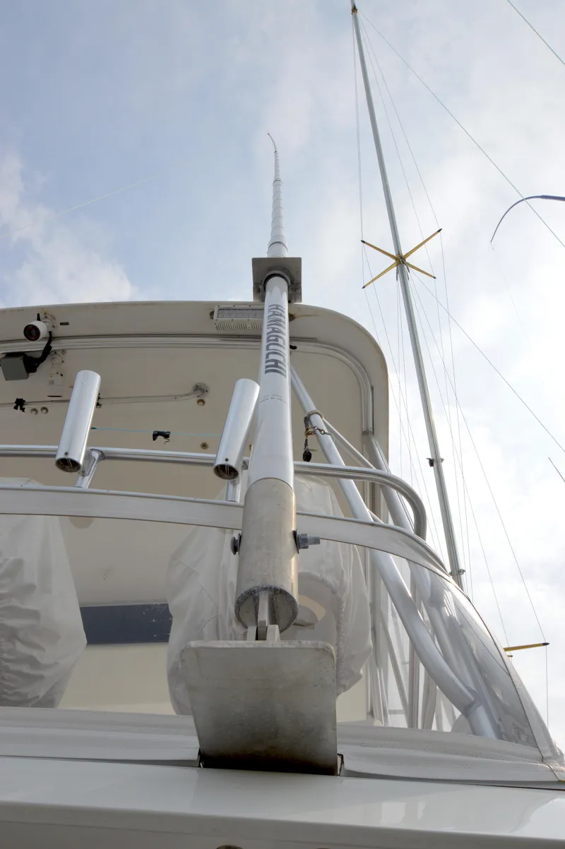 Slide: The Image of 1998 Post 42 Convertible yacht, view of antenna and rigging against cloudy sky. - 42