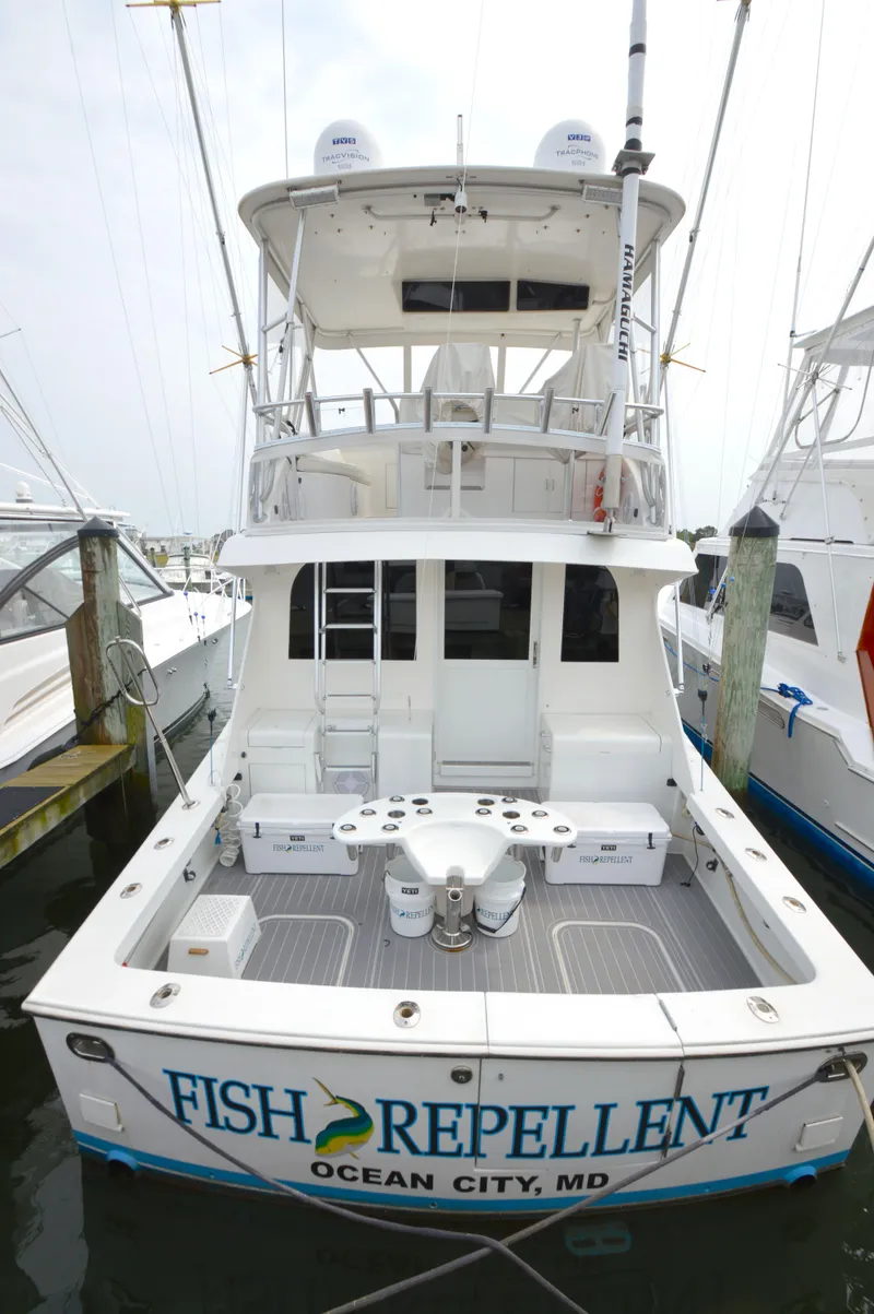 Slide: The Image of 1998 Post 42 Convertible boat named "Fish Repellent" docked in Ocean City, MD. - 8