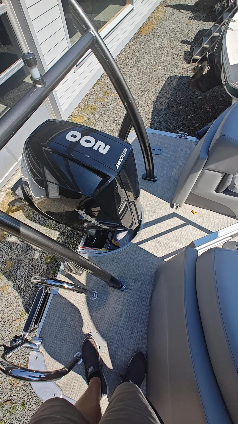 Slide: The Image of 2023 South Bay 523E 2.75 pontoon boat with Mercury 200 outboard motor. - 8