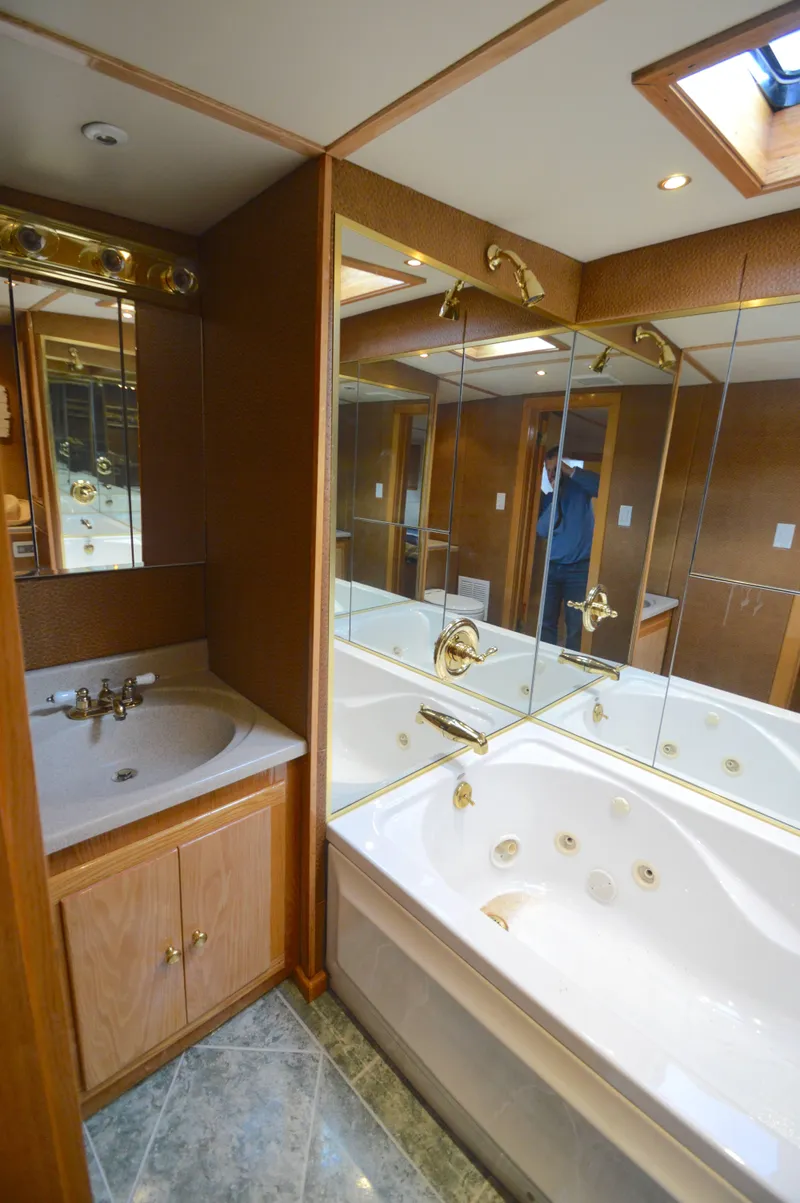 Slide: The Image of Luxurious bathroom with jacuzzi tub in 2004 Chesapeake 58 boat. - 25