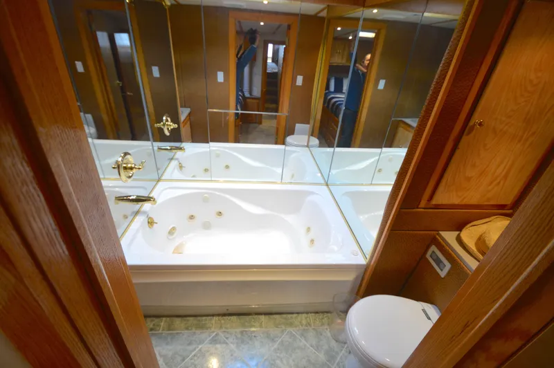 Slide: The Image of Luxurious bathroom with jacuzzi tub in 2004 Chesapeake 58 boat. - 26