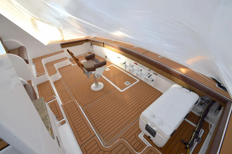 Slide: The Image of Luxurious 2004 Chesapeake 58 boat interior with teak flooring and comfortable seating. - 40