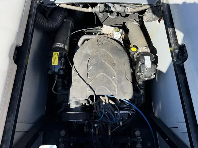 Slide: The Image of 2006 Centurion Enzo SV216 engine compartment with visible components and wiring. - 16