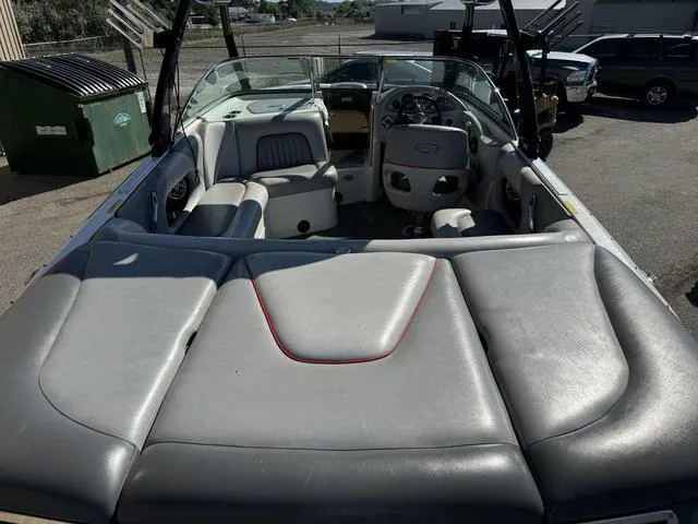 Slide: The Image of 2006 Centurion Enzo SV216 boat interior with gray seating and dashboard. - 4