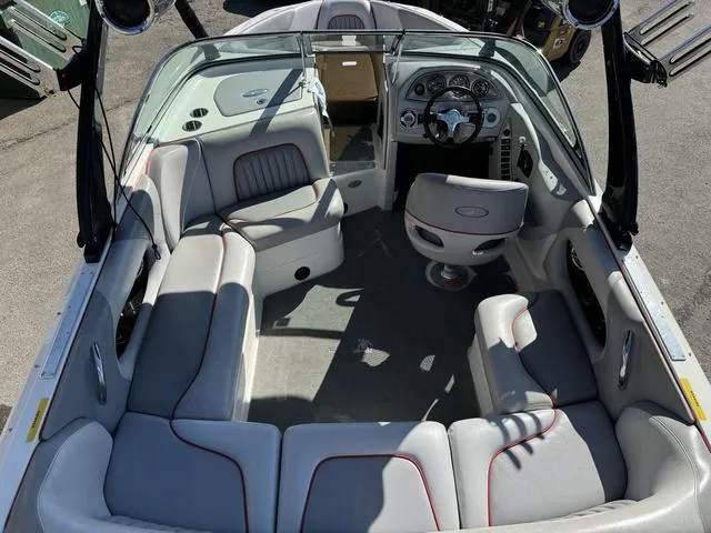 Slide: The Image of Interior of 2006 Centurion Enzo SV216 boat with gray seating and steering console. - 5